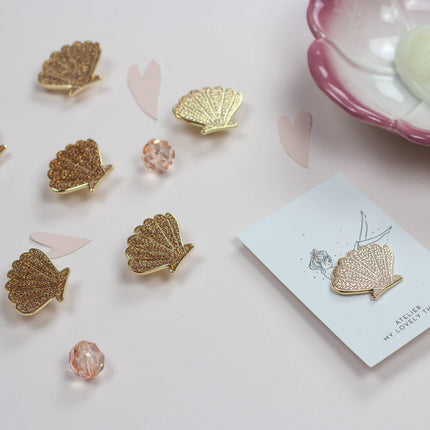 Pin's Coquillage Doré Pailleté