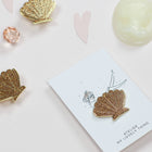 Pin's Coquillage Doré Pailleté