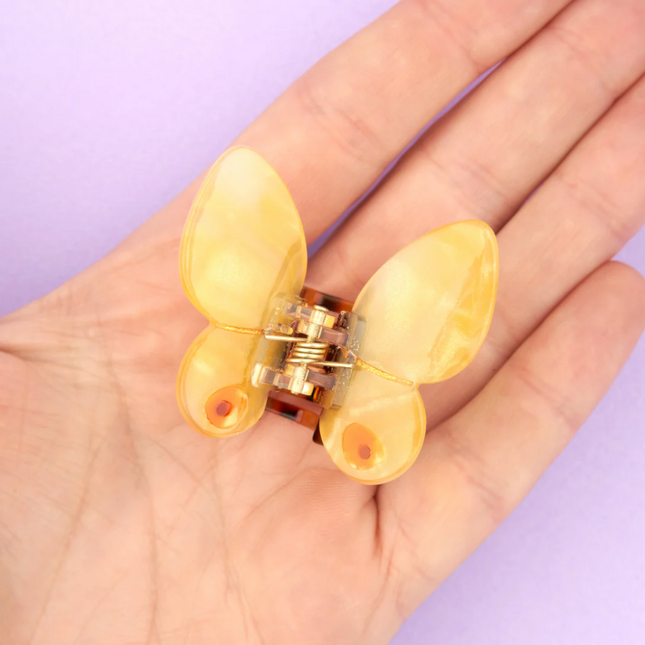 Petite pince à cheveux papillon jaune