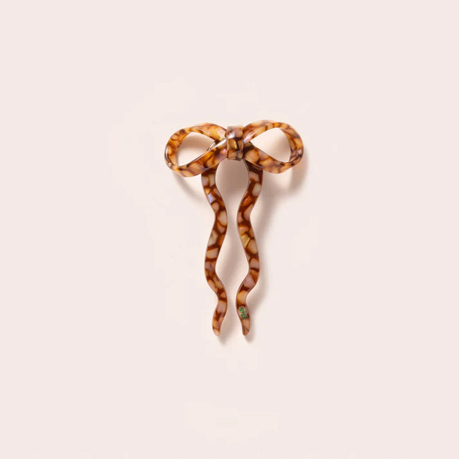 Le pic à chignon noeud cannelle