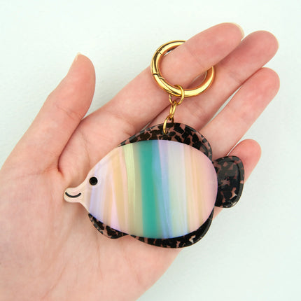 Charm's Poisson tropical